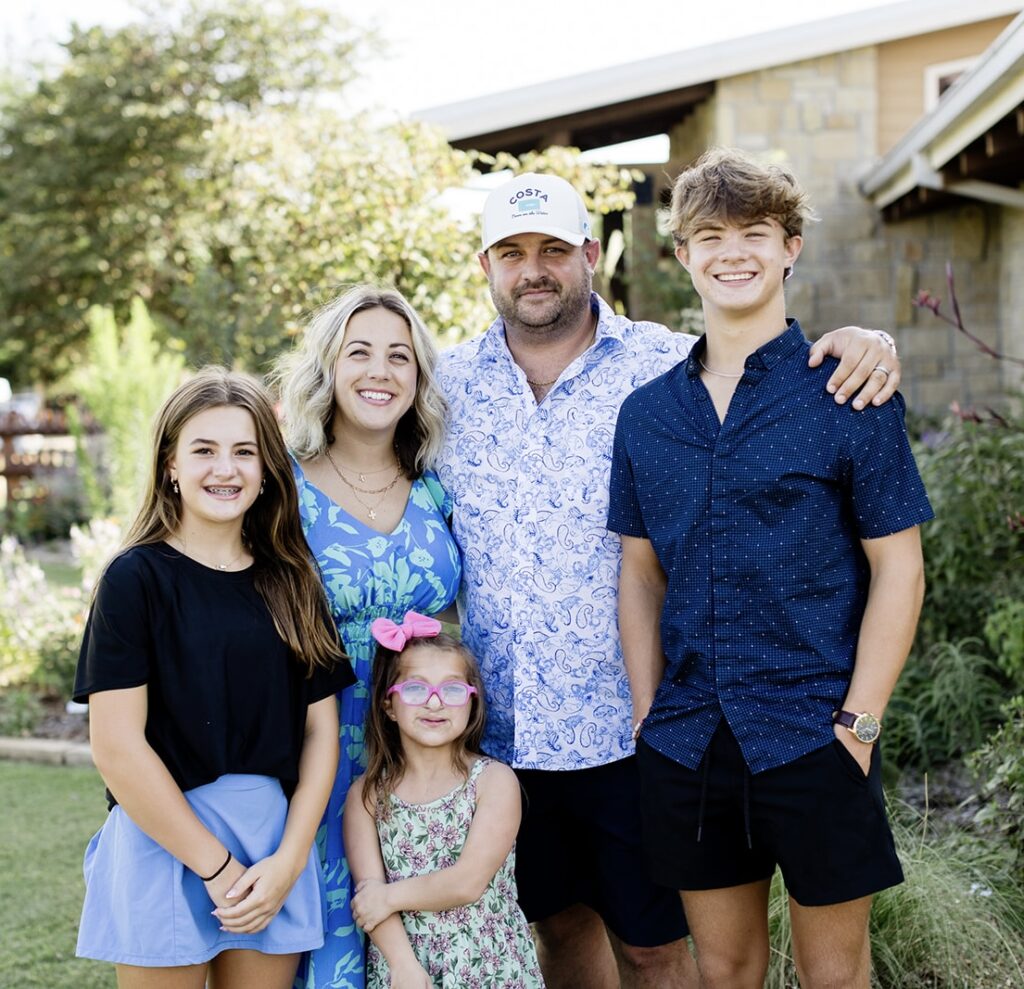 Aduddell Family photo of husband, wife, son and 2 daughters. 